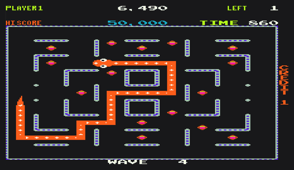 Captura de pantalla del juego Nibbler Rock-Ola de 1982 que muestra una serpiente ondulando a través de un laberinto al estilo Pac-Man.